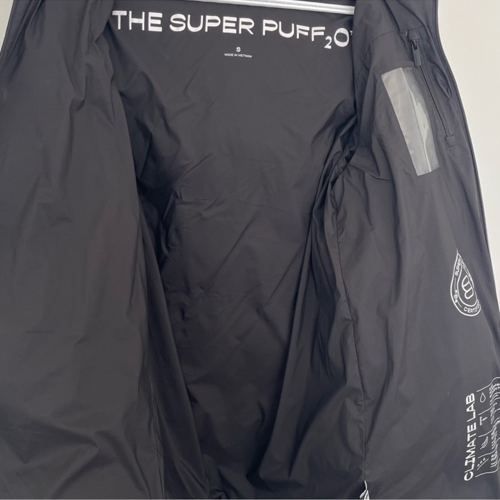 Aritzia Black Hooded Puffer Coat

The Super Puff, Om Mid - Rainstop Size S - Picture 3 of 7